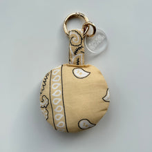 Load image into Gallery viewer, BUTTER CREAM PUFFY SMILEY FACE BOOM BANDANA BAG CHARM