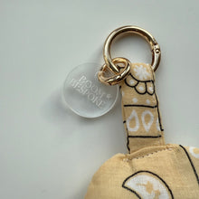 Load image into Gallery viewer, BUTTER CREAM PUFFY SMILEY FACE BOOM BANDANA BAG CHARM