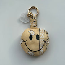 Load image into Gallery viewer, BUTTER CREAM PUFFY SMILEY FACE BOOM BANDANA BAG CHARM