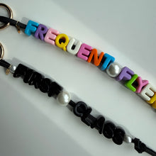 Load image into Gallery viewer, ‘TRAVEL’ CHUNKY LEATHER BEADED BAG CHARM BY BOOM BESPOKE
