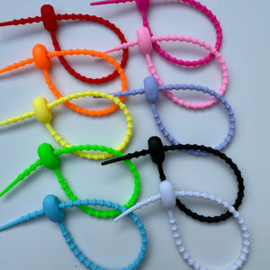 RUBBER ADJUSTABLE BAG CHARM CONNECTOR