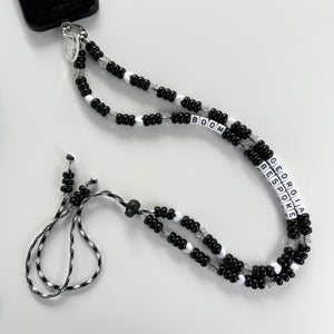 ´BOOMONO’ BLACK & WHITE ADJUSTABLE CROSSBODY PHONE STRAP