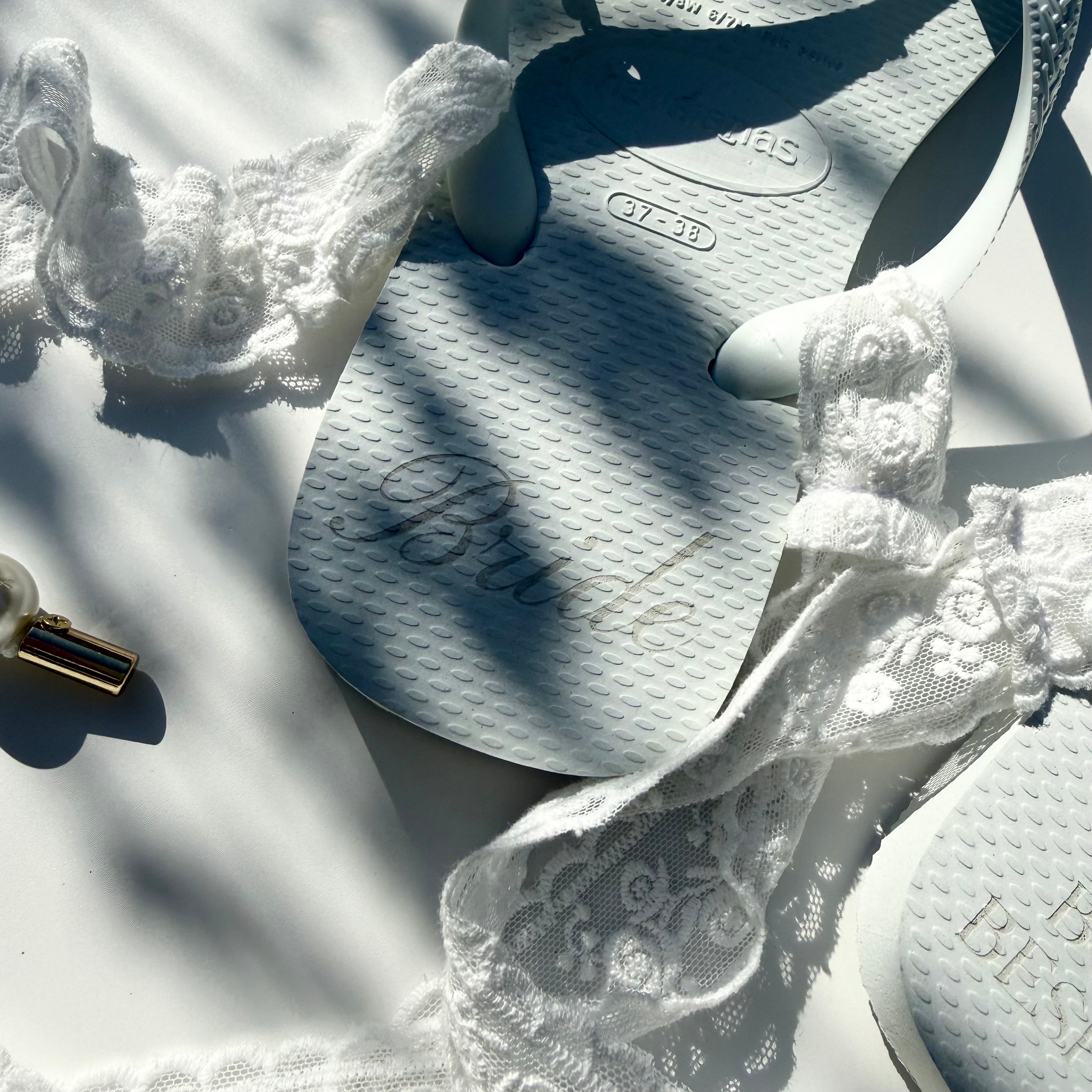 ‘BRIDE’ WHITE LACE HAVAIANAS TOP FLIP FLOPS BY BOOM BESPOKE
