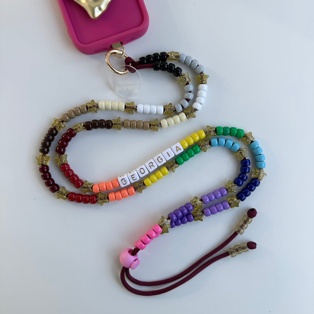 ‘THE NEW BOOMBOW’ RAINBOW ADJUSTABLE CROSSBODY PHONE STRAP