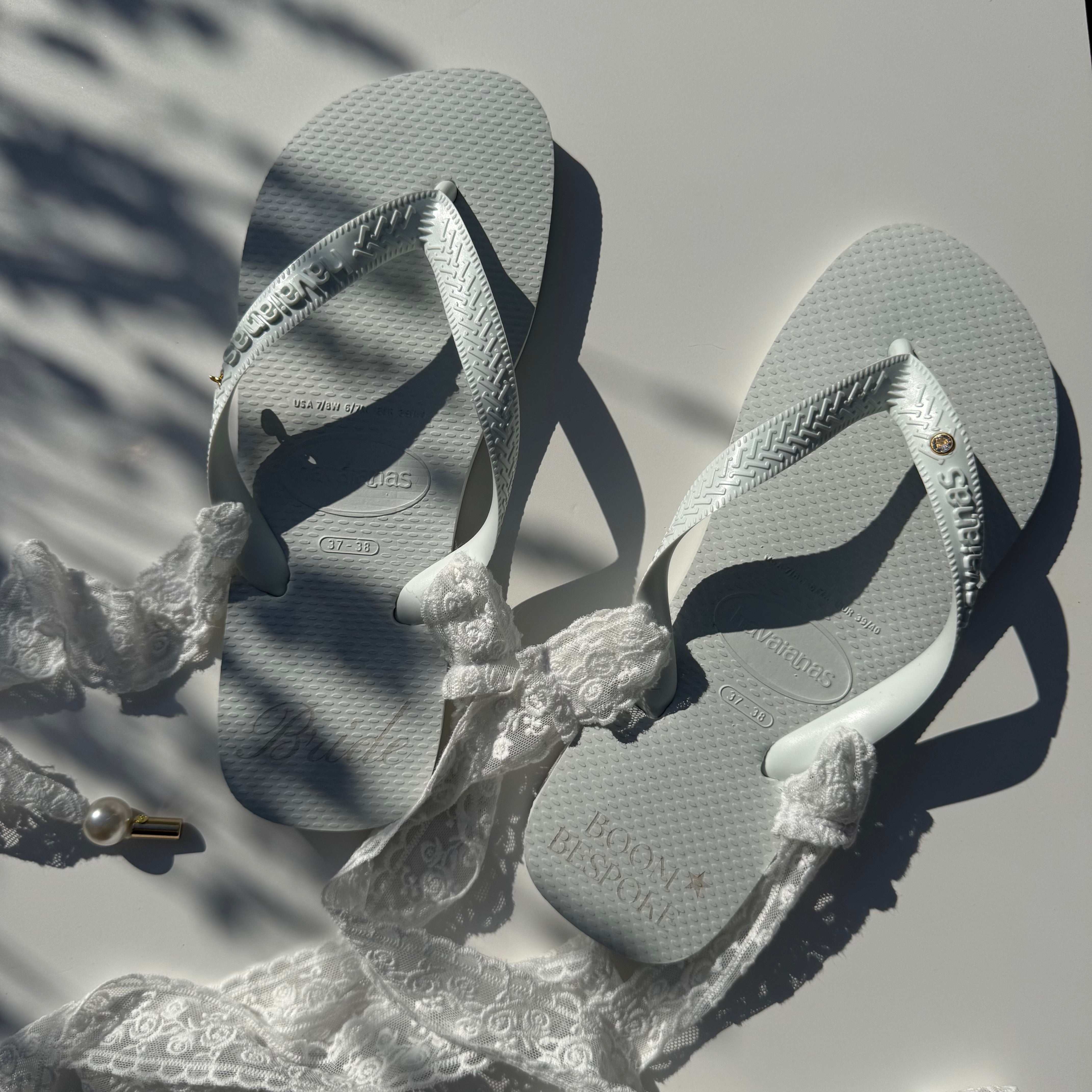 ‘BRIDE’ WHITE LACE HAVAIANAS TOP FLIP FLOPS BY BOOM BESPOKE