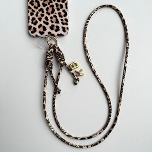 THE LEOPARD BALLOON LETTER INITIAL LONG CROSSBODY PHONE STRAP