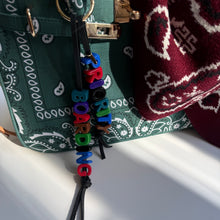 Load image into Gallery viewer, ‘PRIORITY BOARDING’ CHUNKY LEATHER BEADED BAG CHARM BY BOOM BESPOKE
