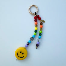 Load image into Gallery viewer, ‘S🌈ILE’ RAINBOW CRYSTAL SMILEY BAG CHARM / KEYRING BY BOOMBESPOKE

