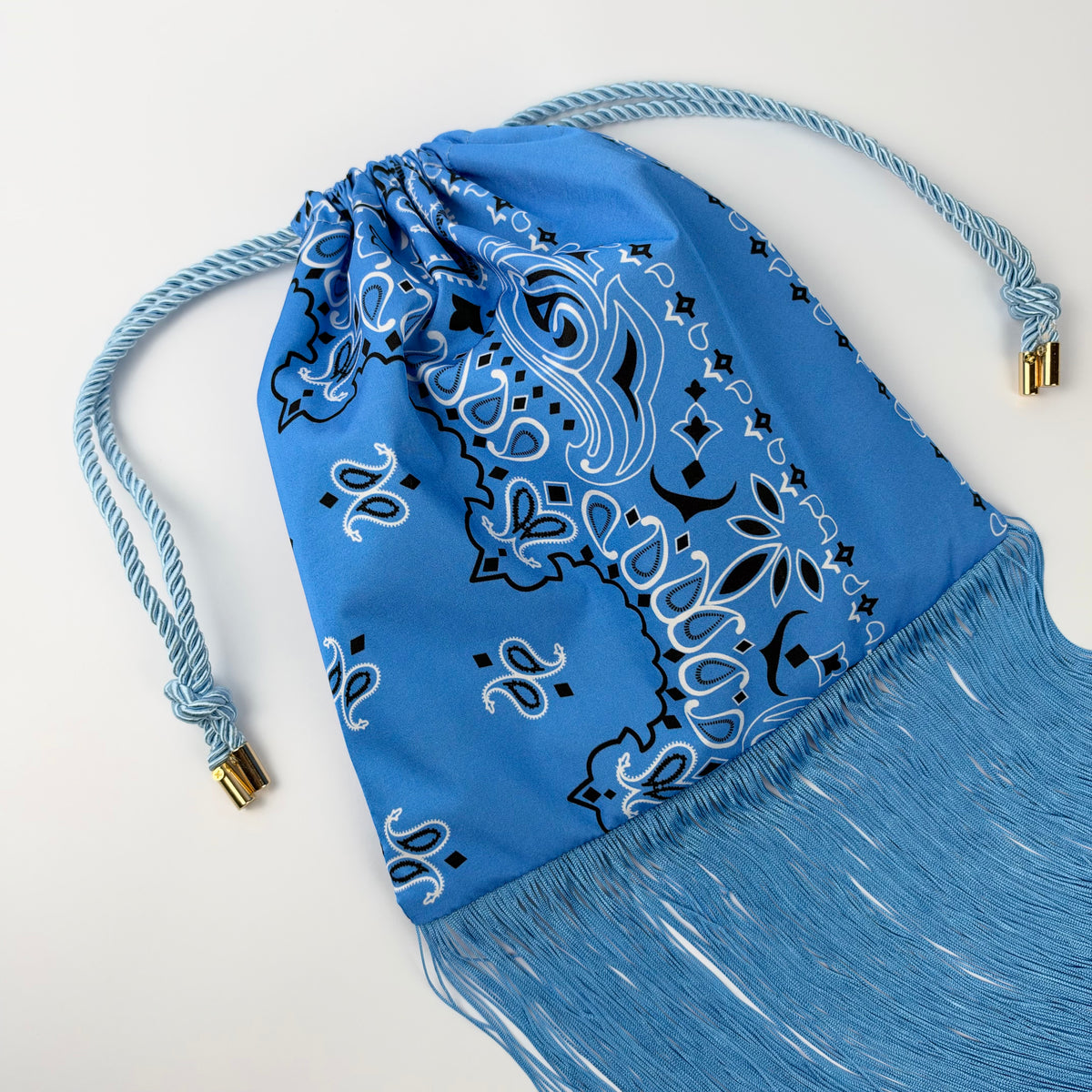 THE NANAN BLUE FRINGE POUCH BAG