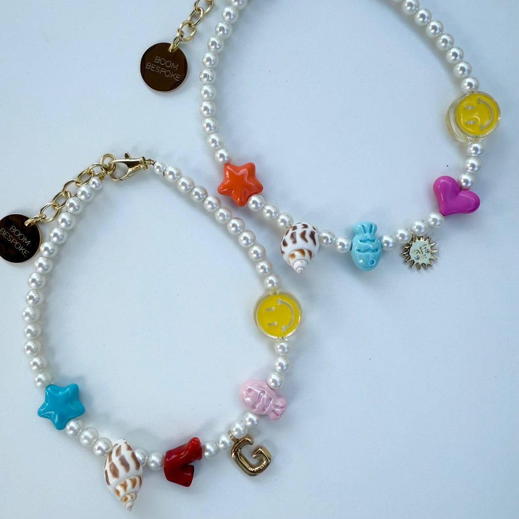 ´SUNNY SMILES’ FAUX PEARL CHARM NECKLACE BY BOOM BESPOKE