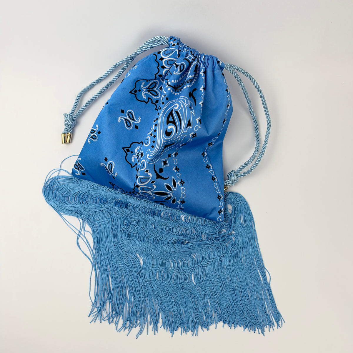 THE NANAN BLUE FRINGE POUCH BAG