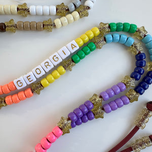 ‘THE NEW BOOMBOW’ RAINBOW ADJUSTABLE CROSSBODY PHONE STRAP