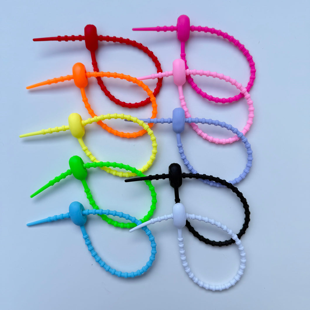 RUBBER ADJUSTABLE BAG CHARM CONNECTOR