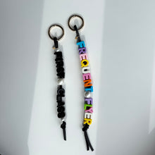 Load image into Gallery viewer, ‘TRAVEL’ CHUNKY LEATHER BEADED BAG CHARM BY BOOM BESPOKE
