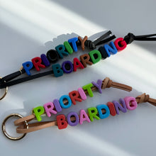 Load image into Gallery viewer, ‘PRIORITY BOARDING’ CHUNKY LEATHER BEADED BAG CHARM BY BOOM BESPOKE

